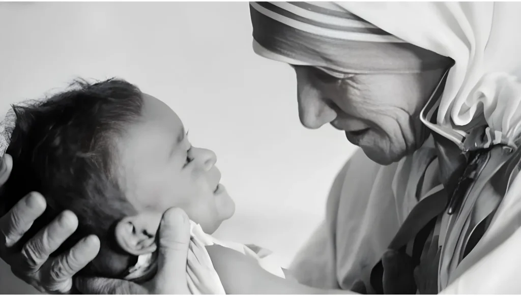 Mother Teresa Holding a Baby