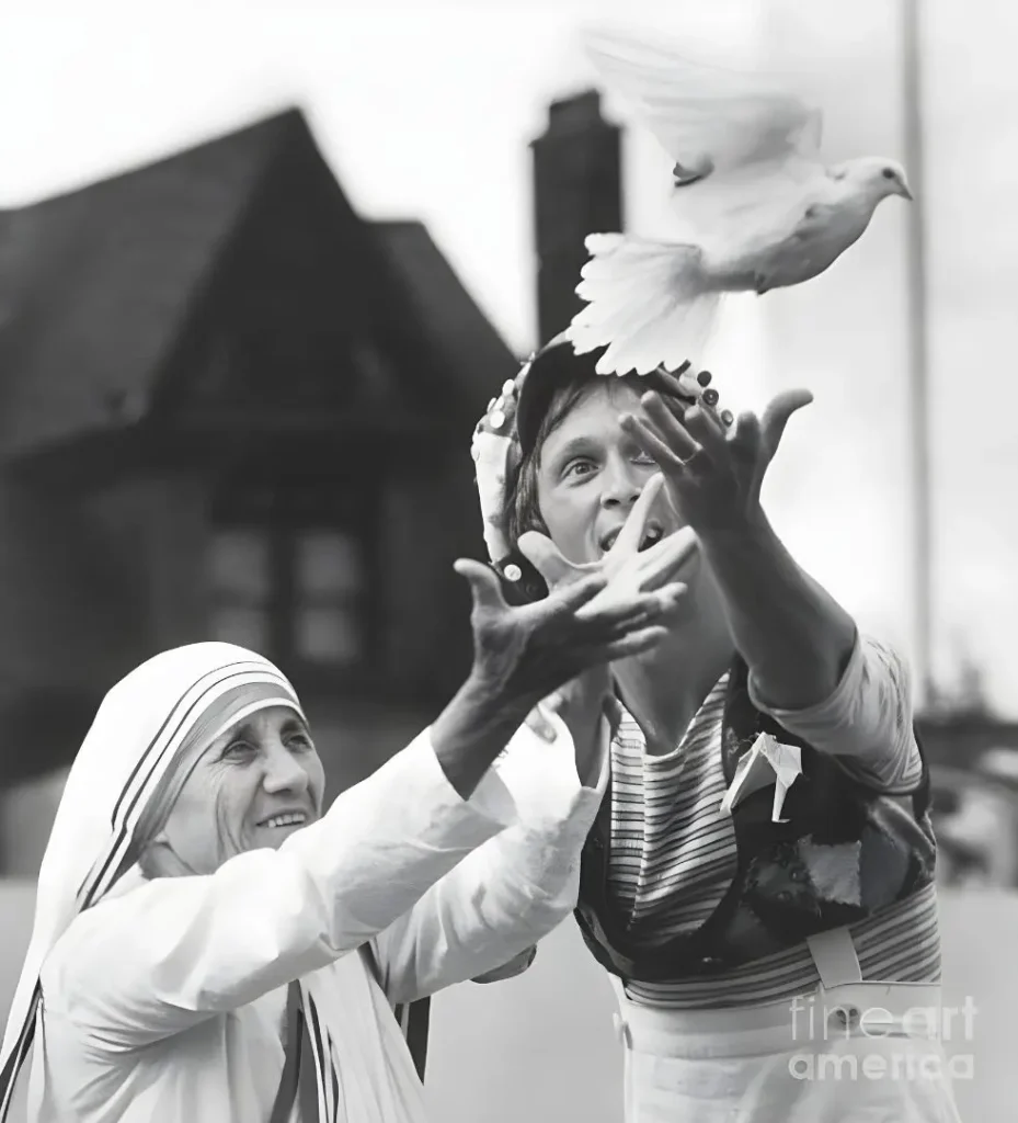 Mother Teresa releasing a dove